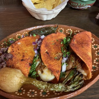 Taquero Mucho signature dishes TacosBurritoMacheteVolcanes